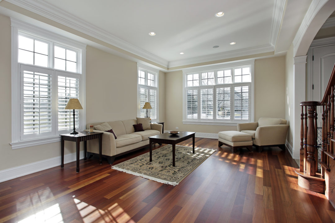 Living room with cherry wood flooring - E Charrier